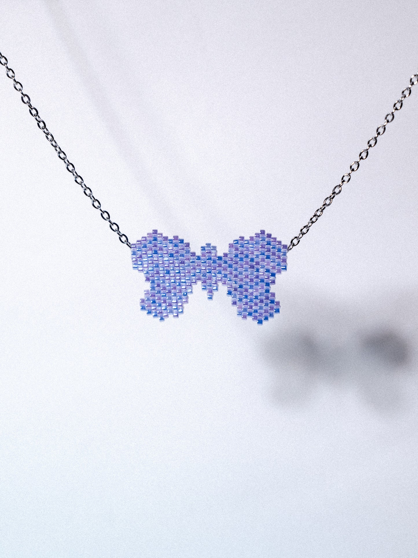 #_3 Lavender mini butterfly body chain ss26